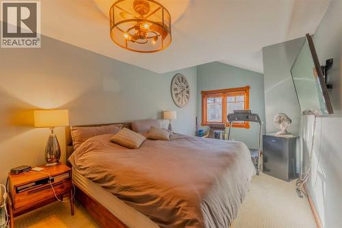 313, 170 Crossbow Place, Canmore, AB - Indoor Photo Showing Bedroom