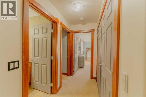 313, 170 Crossbow Place, Canmore, AB - Indoor Photo Showing Other Room