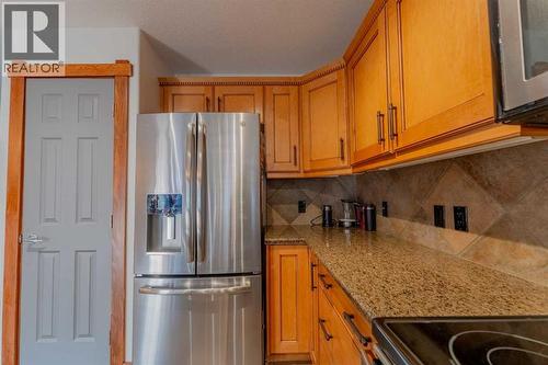 313, 170 Crossbow Place, Canmore, AB - Indoor Photo Showing Kitchen