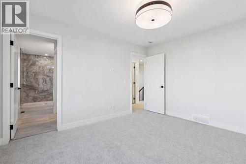 120 Quartz Crescent, Cochrane, AB - Indoor Photo Showing Other Room