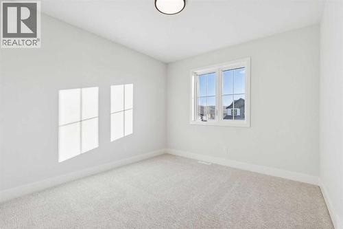 120 Quartz Crescent, Cochrane, AB - Indoor Photo Showing Other Room