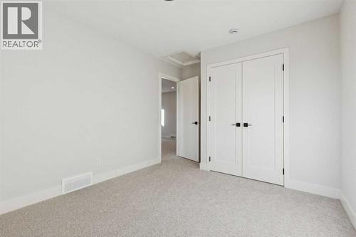 120 Quartz Crescent, Cochrane, AB - Indoor Photo Showing Other Room