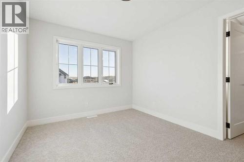 120 Quartz Crescent, Cochrane, AB - Indoor Photo Showing Other Room