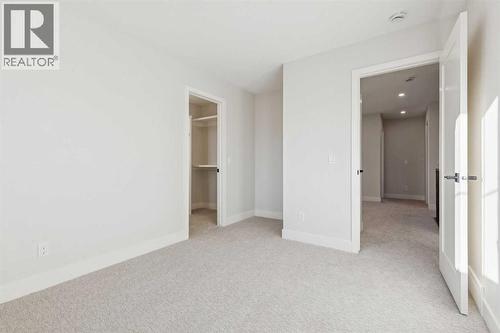 120 Quartz Crescent, Cochrane, AB - Indoor Photo Showing Other Room