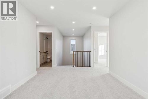 120 Quartz Crescent, Cochrane, AB - Indoor Photo Showing Other Room
