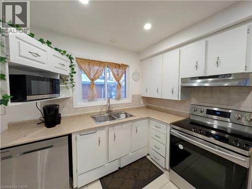 208 West 19Th Street, Hamilton, ON - Indoor Photo Showing Kitchen With Double Sink