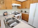 1919 Bur Oak Avenue, Markham, ON  - Indoor Photo Showing Kitchen With Double Sink 