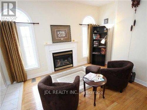 1919 Bur Oak Avenue, Markham, ON - Indoor Photo Showing Living Room With Fireplace