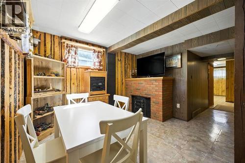 6383 32 Avenue Nw, Calgary, AB - Indoor With Fireplace