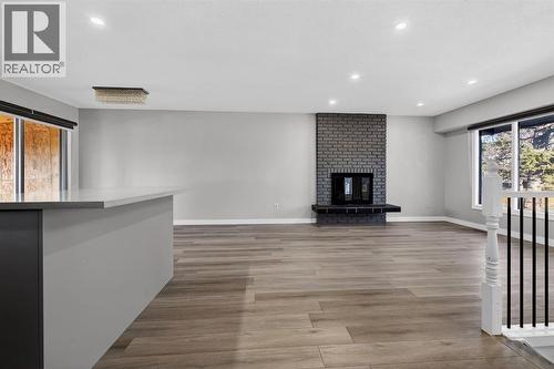 255 Rundleridge Drive Ne, Calgary, AB - Indoor With Fireplace
