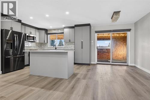 255 Rundleridge Drive Ne, Calgary, AB - Indoor Photo Showing Kitchen With Upgraded Kitchen