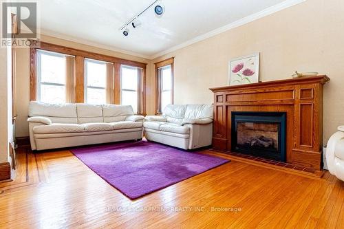 88 Cline Avenue N, Hamilton, ON - Indoor Photo Showing Living Room With Fireplace