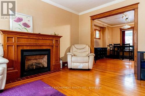 88 Cline Avenue N, Hamilton, ON - Indoor Photo Showing Living Room With Fireplace