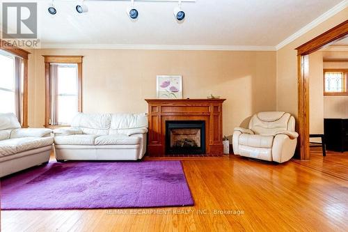 88 Cline Avenue N, Hamilton, ON - Indoor Photo Showing Living Room With Fireplace