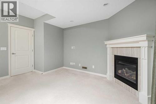 53 Sage Bank Link Nw, Calgary, AB - Indoor With Fireplace