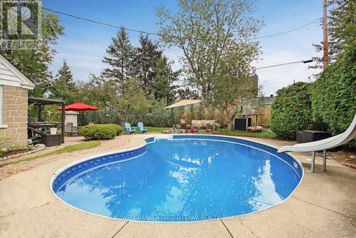 413 Island Park Drive, Ottawa, ON - Outdoor With In Ground Pool With Backyard