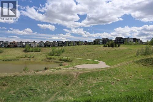 Across from Ravine & Pond - 27 Nolanlake Point Nw, Calgary, AB - Outdoor With View