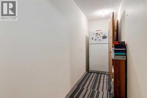 35 Woodstock Road Sw, Calgary, AB - Indoor Photo Showing Other Room