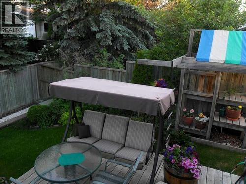 35 Woodstock Road Sw, Calgary, AB - Outdoor With Deck Patio Veranda With Backyard