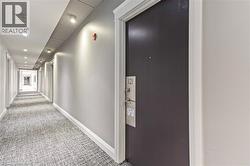 Corridor featuring carpet floors and recessed lighting - 