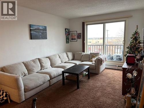 432, 1237 4 Avenue S, Lethbridge, AB - Indoor Photo Showing Living Room