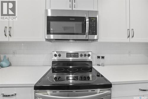 242 Brighton Gate, Saskatoon, SK - Indoor Photo Showing Kitchen With Upgraded Kitchen