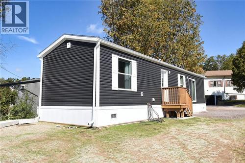 View of front of home featuring crawl space and a front yard - 1085 Concession 10 Road W Unit# 23, Flamborough, ON - Outdoor