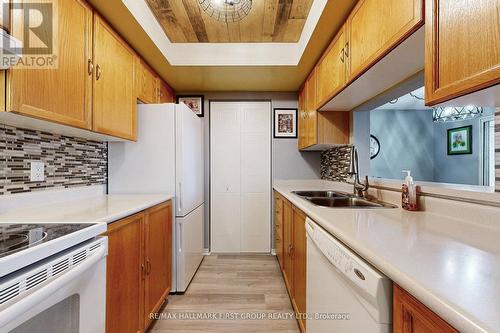 218 - 8351 Mclaughlin Road S, Brampton, ON - Indoor Photo Showing Kitchen With Double Sink