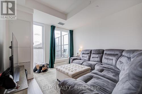 211 - 1285 Queen Street E, Toronto, ON - Indoor Photo Showing Living Room