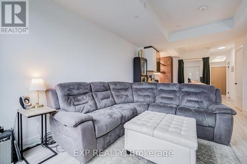 211 - 1285 Queen Street E, Toronto, ON - Indoor Photo Showing Living Room