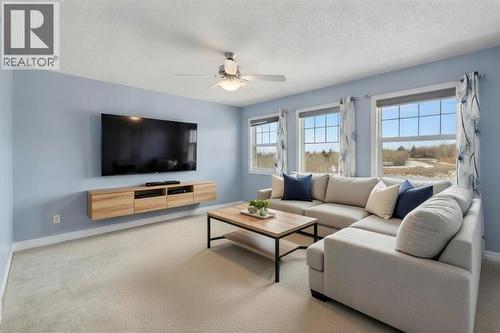 V-Staged - 72 Rockyspring Circle Nw, Calgary, AB - Indoor Photo Showing Living Room