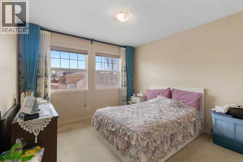 72 Rockyspring Circle Nw, Calgary, AB - Indoor Photo Showing Bedroom