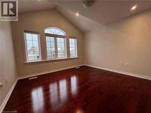 Unfurnished room with lofted ceiling, dark wood finished floors, and recessed lighting - 24 Hazelton Avenue, Hamilton, ON - Indoor Photo Showing Other Room