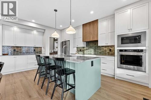 Soft Close Hinges - 24 Napoleon Meadows Way, Innisfail, AB - Indoor Photo Showing Kitchen With Upgraded Kitchen