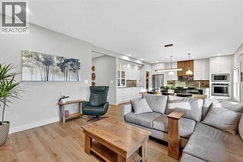 1036 sqft Main Level - 24 Napoleon Meadows Way, Innisfail, AB - Indoor Photo Showing Living Room