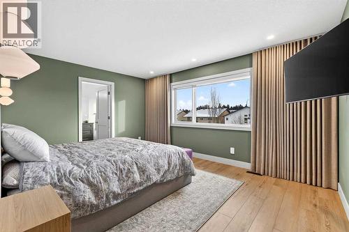 Primary Bedroom / Triple Pane Windows - 24 Napoleon Meadows Way, Innisfail, AB - Indoor Photo Showing Bedroom