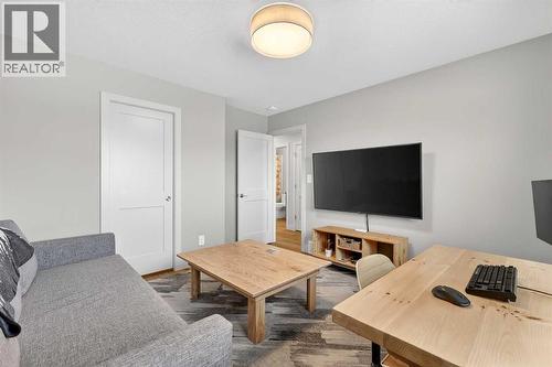 24 Napoleon Meadows Way, Innisfail, AB - Indoor Photo Showing Living Room
