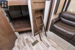 Bedroom featuring light wood finished floors - 