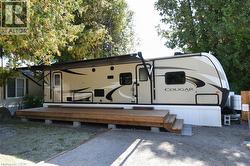 Rear view of house featuring a deck - 