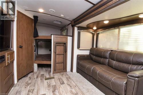 Living area with light wood-style flooring - 1085 10Th Concession Road W Unit# 29, Flamborough, ON - Indoor Photo Showing Other Room