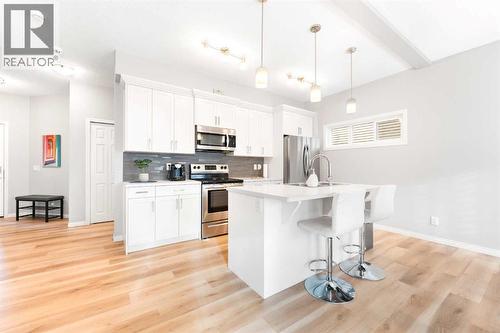 13 Walcrest Way Se, Calgary, AB - Indoor Photo Showing Kitchen With Upgraded Kitchen