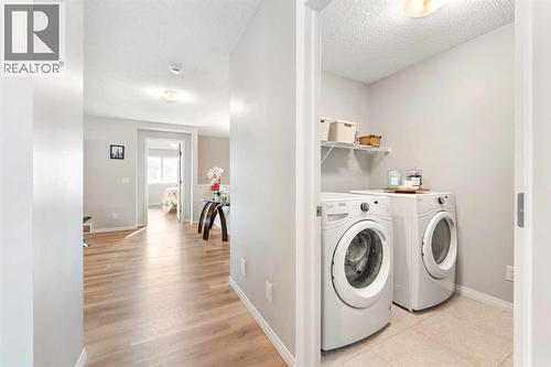 13 Walcrest Way Se, Calgary, AB - Indoor Photo Showing Laundry Room