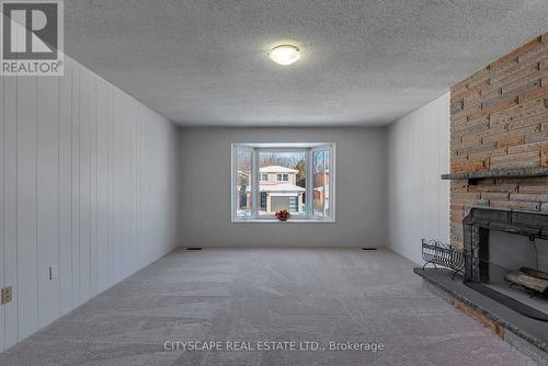1210 Shagbark Crescent, Mississauga, ON - Indoor Photo Showing Living Room With Fireplace
