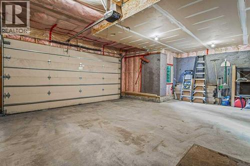 215 Miskow Close, Canmore, AB - Indoor Photo Showing Garage