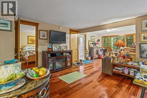 215 Miskow Close, Canmore, AB - Indoor With Fireplace