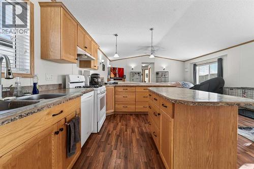 5004 Seasons Boulevard, Coaldale, AB - Indoor Photo Showing Kitchen