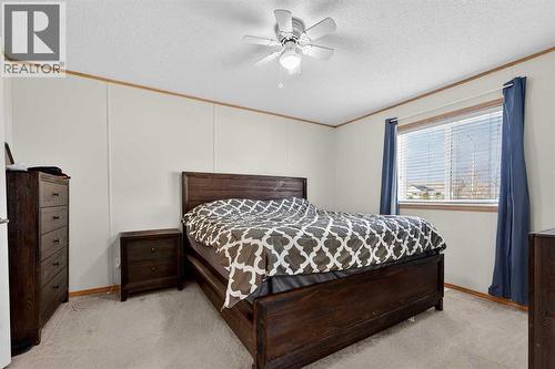 5004 Seasons Boulevard, Coaldale, AB - Indoor Photo Showing Bedroom