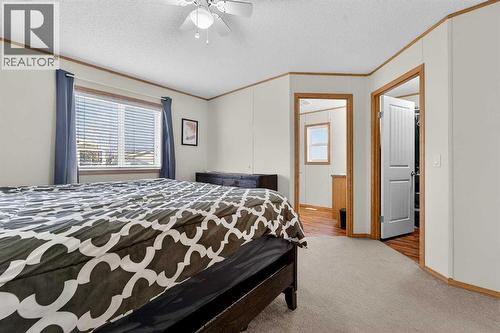 5004 Seasons Boulevard, Coaldale, AB - Indoor Photo Showing Bedroom