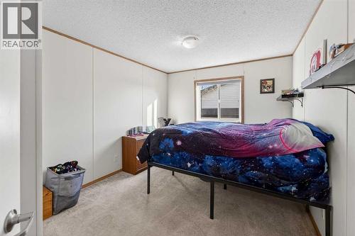 5004 Seasons Boulevard, Coaldale, AB - Indoor Photo Showing Bedroom