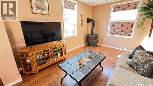 214 Marsh Street, Maple Creek, SK - Indoor Photo Showing Other Room With Fireplace